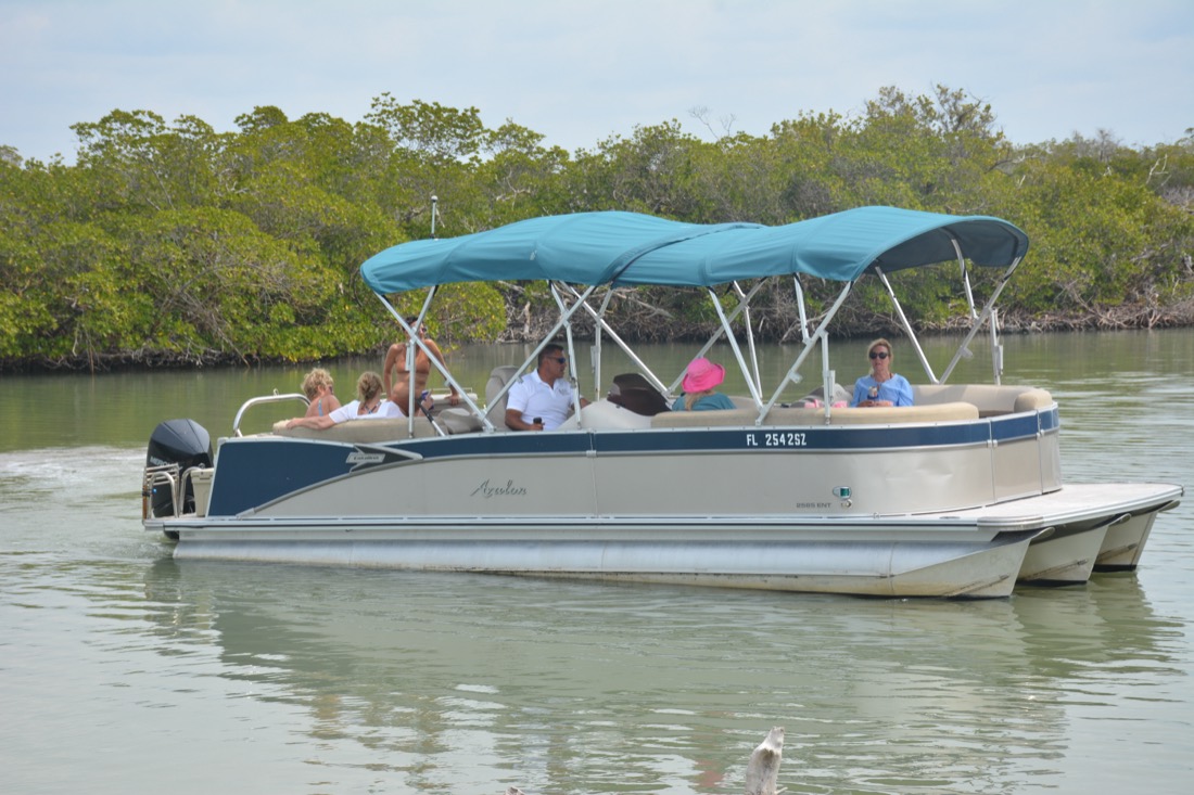 The Sand Dollar Boat Tours Avalon family tritoon cruising the Ten Thousand Islands near Marco Island
