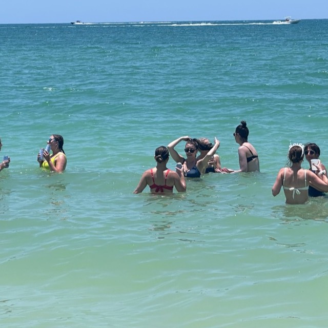 Bachelorette party celebrating aboard a Sand Dollar private charter near Naples, Florida