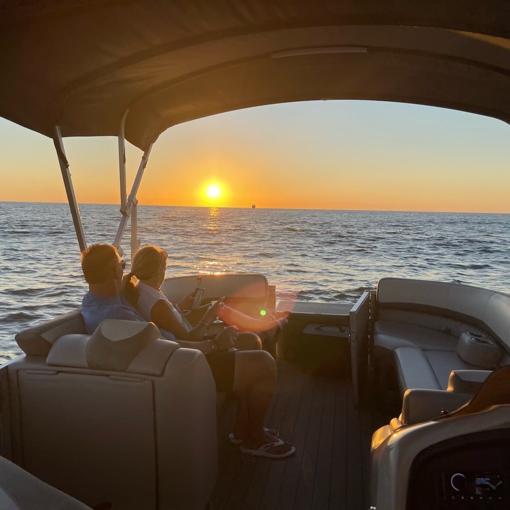 A golden Marco Island sunset over the Gulf of Mexico on a Sand Dollar sunset cruise