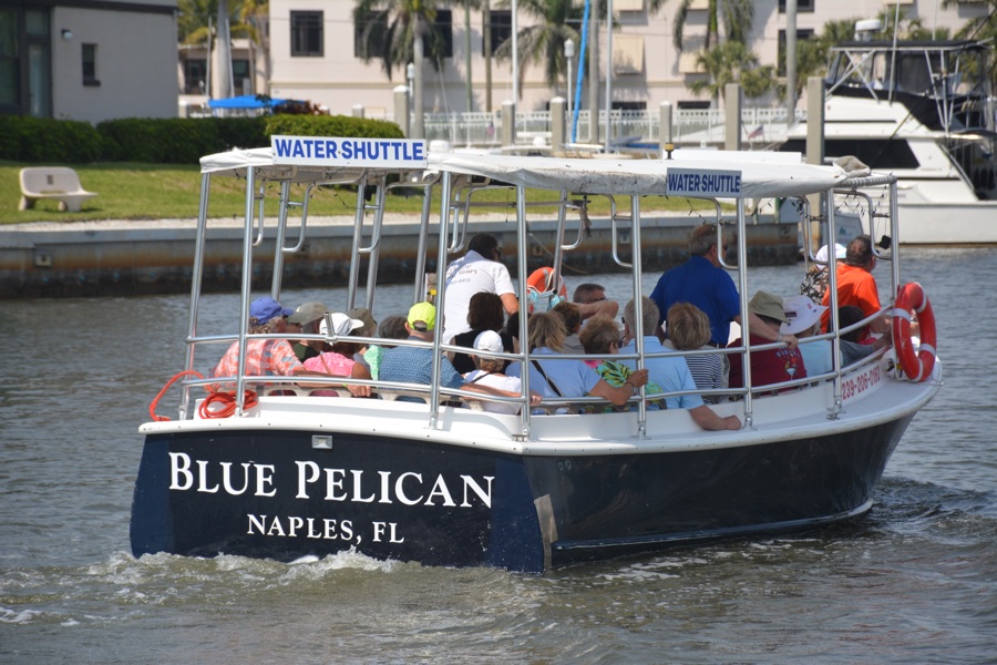 Two Blue Pelican water shuttles on Naples Bay near the marina, Naples, Florida
